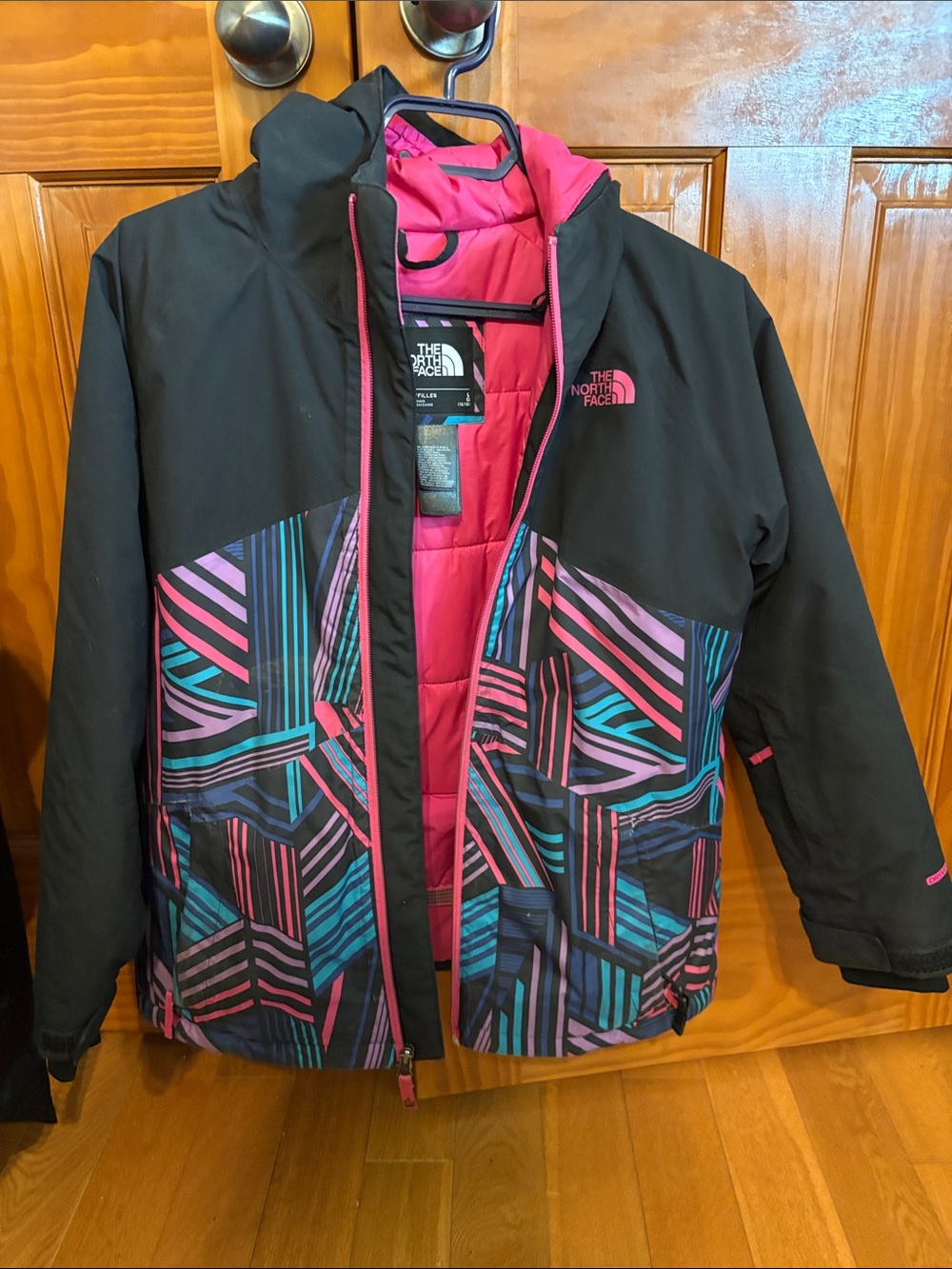 The North Face Kids' Black Jacket with Pink, Teal & Purple Geometric Print